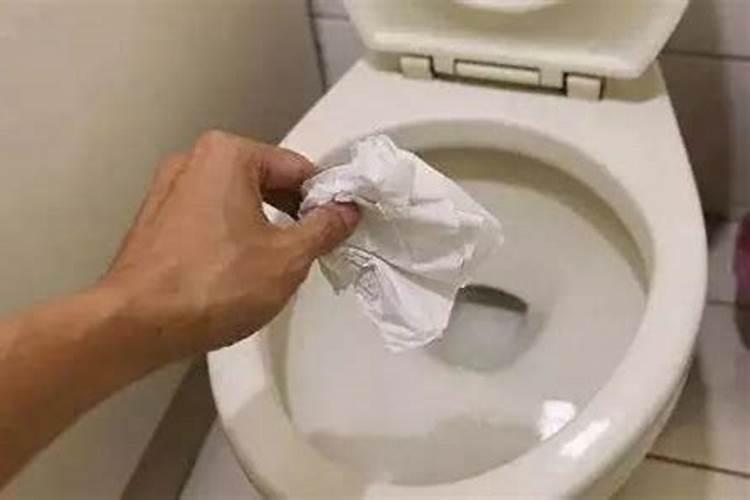 梦见手拿屎后扔进厕所